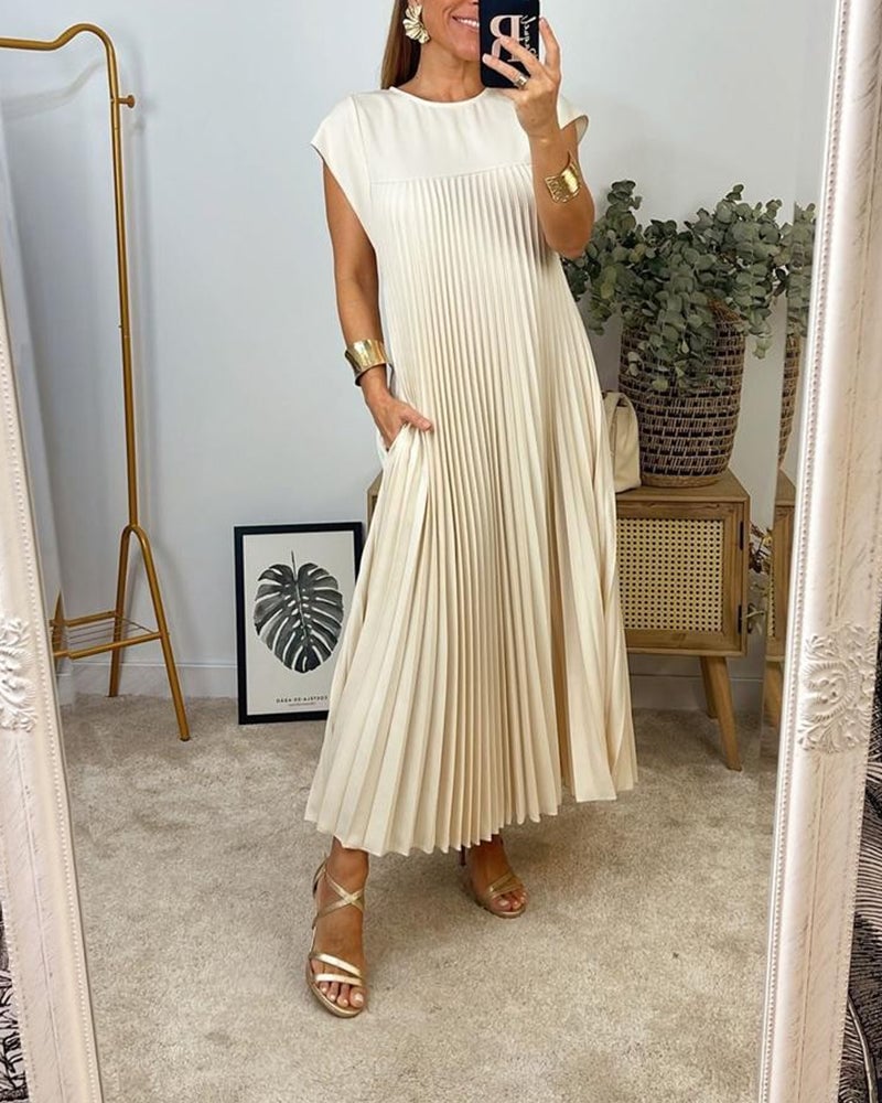 Elegant pleated women's dress. Timeless comfort for versatile casual or formal wear.
