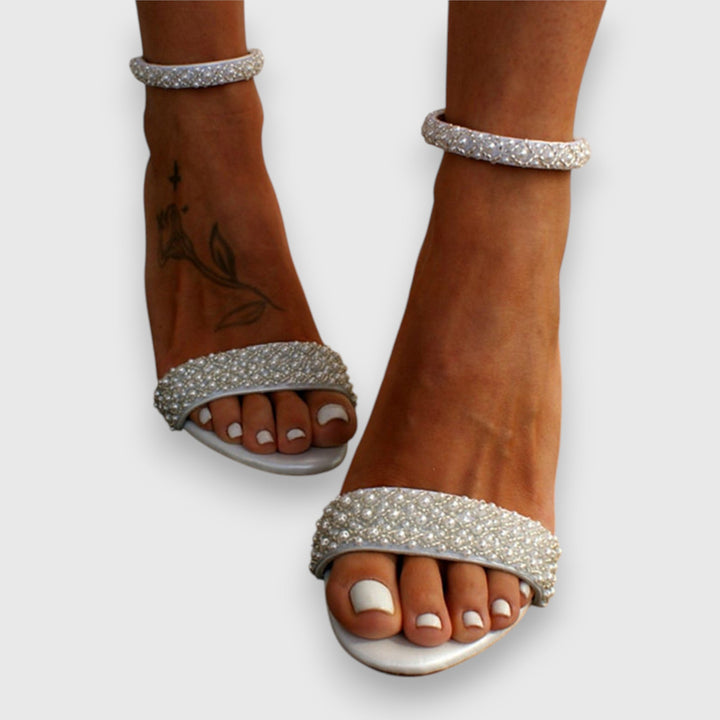 Elegant open-toe heeled sandals for women with comfortable block heel & ankle strap. Perfect dress & party shoes.