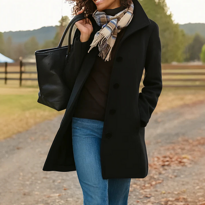 Classic long women's coat, elegant & warm outerwear for stylish office wear or everyday fall and winter fashion.