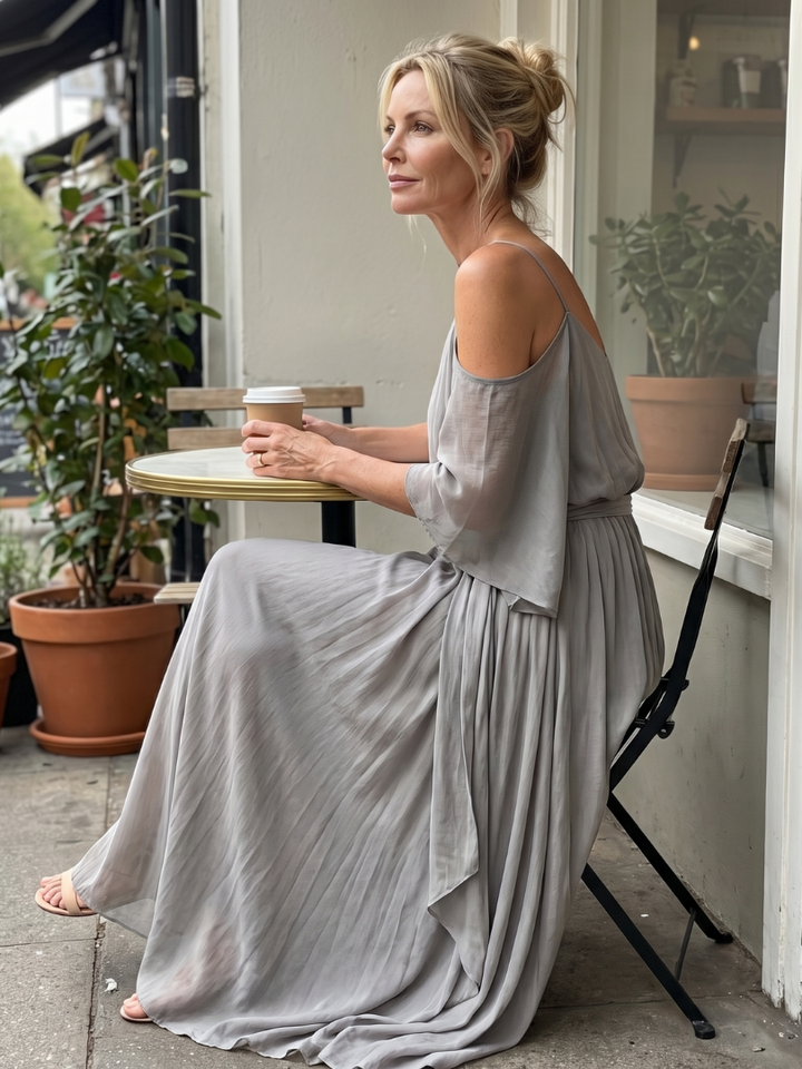 Complete women's grey outfit: layered drape cold shoulder top & wide leg pants. Chic and comfortable two-piece set.