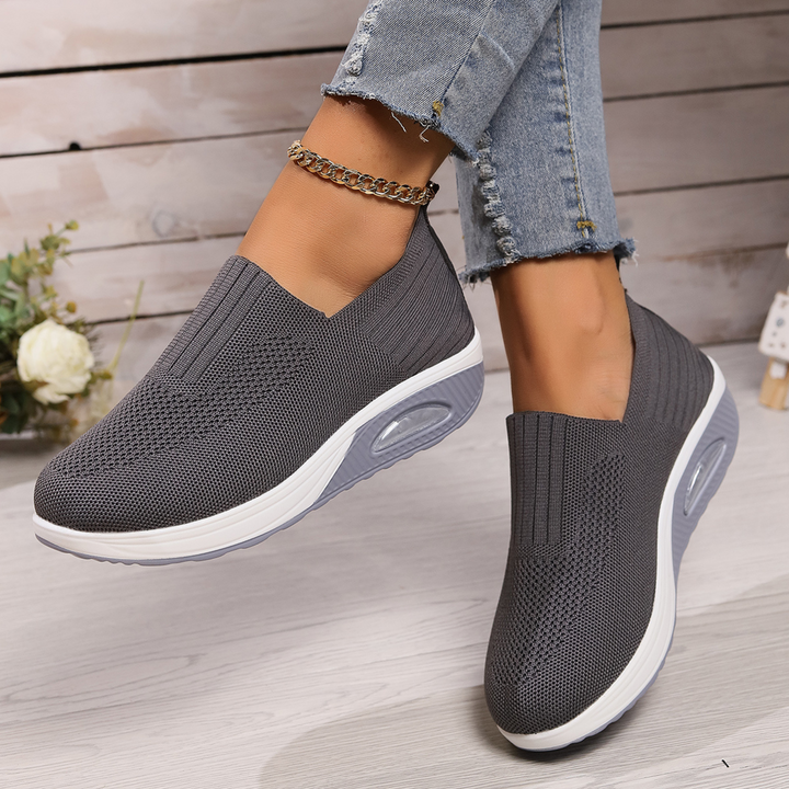Elegant women's comfort sneakers with superior pain relief features & supportive arch design.