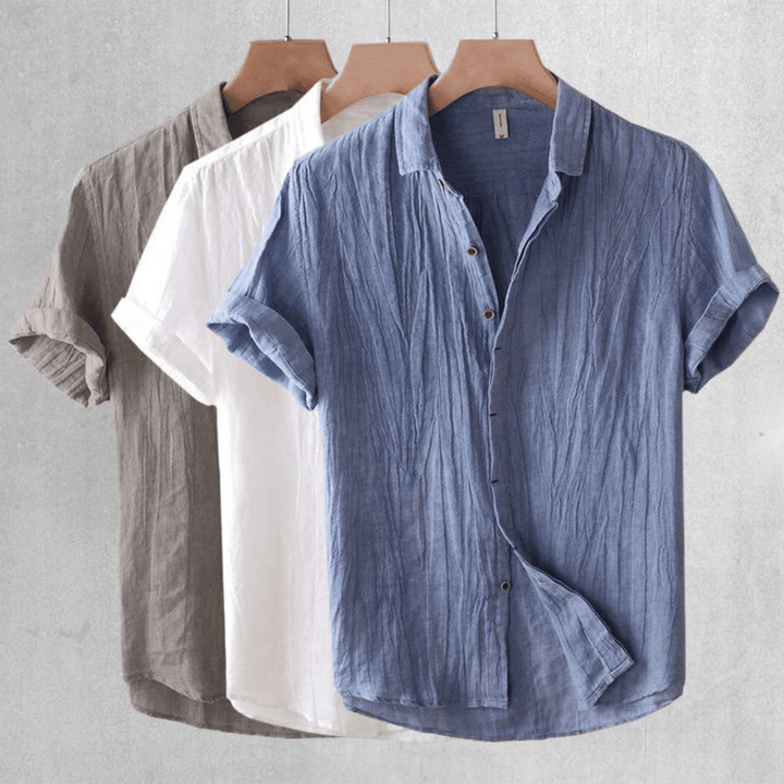 Breathable women's short sleeve cotton top, an elegant summer shirt designed for ultimate comfort.