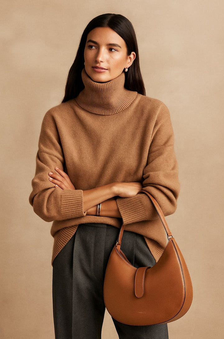 Soft, cozy women's long sleeve turtleneck jumper. Versatile for relaxed everyday comfort.