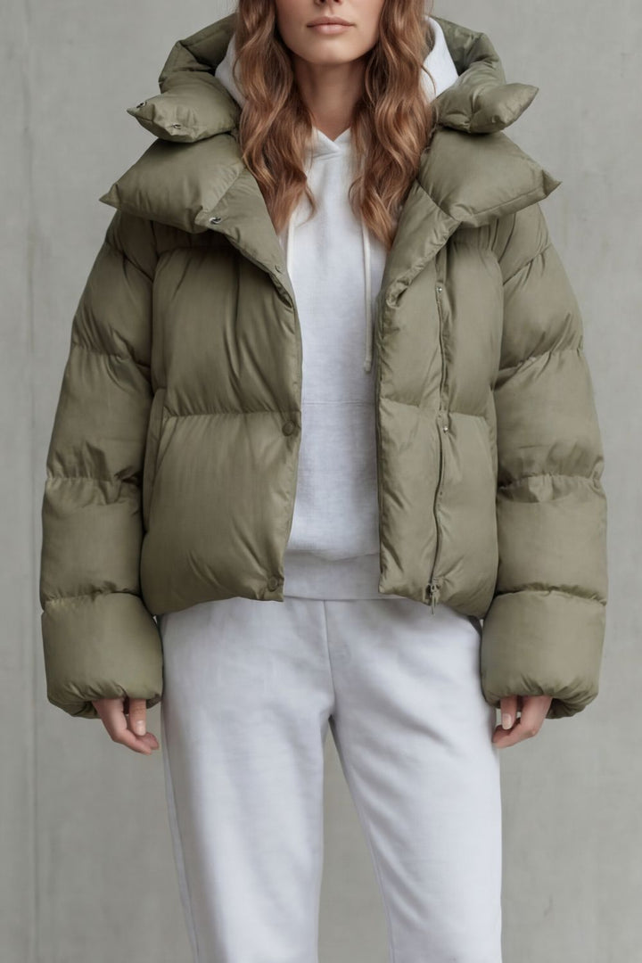 Cream women's cloud-soft cropped puffer jacket, ideal for cozy winter warmth and style.
