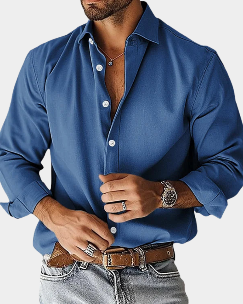 Man wearing a tailored fit button-down shirt, perfect for smart everyday or work. Comfortable & stylish.