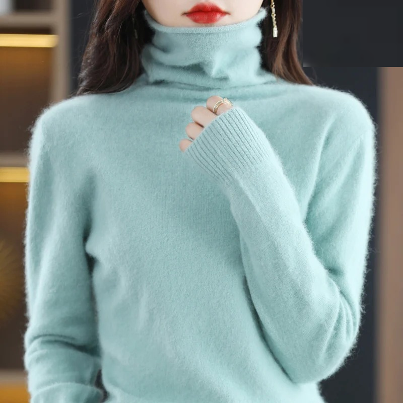 Elegant ladies' long sleeve turtleneck sweater, warm & comfy for autumn/winter style.