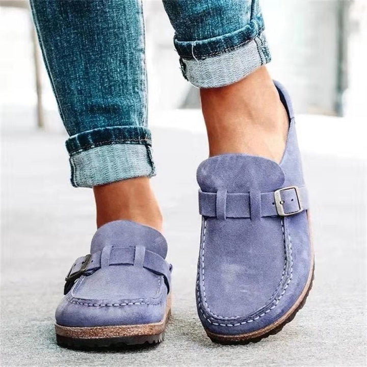 Close-up of women's supportive orthopaedic slip-on, highlighting ergonomic footbed for all-day comfort.