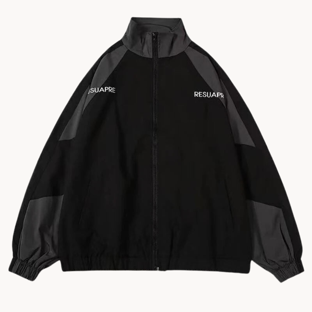 Close-up of the Men's Meridian performance track jacket, highlighting its lightweight, stretch fabric for comfort.