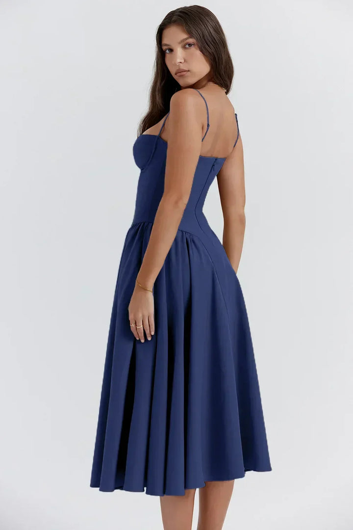 Women's sleeveless cocktail dress, featuring an elegant corset bodice and chic midi length.