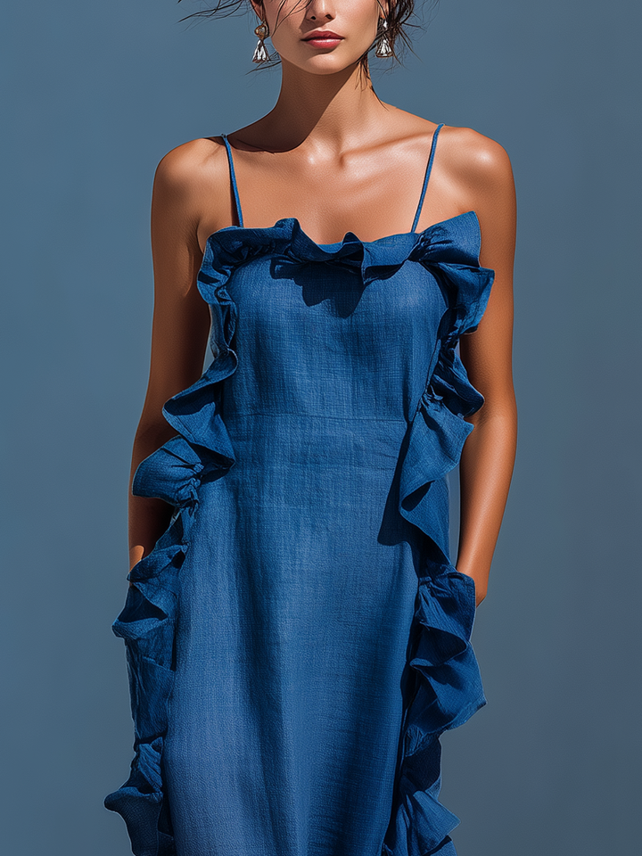 Relaxed fit women's flowing maxi dress with delicate straps, ideal for comfortable vacation wear.