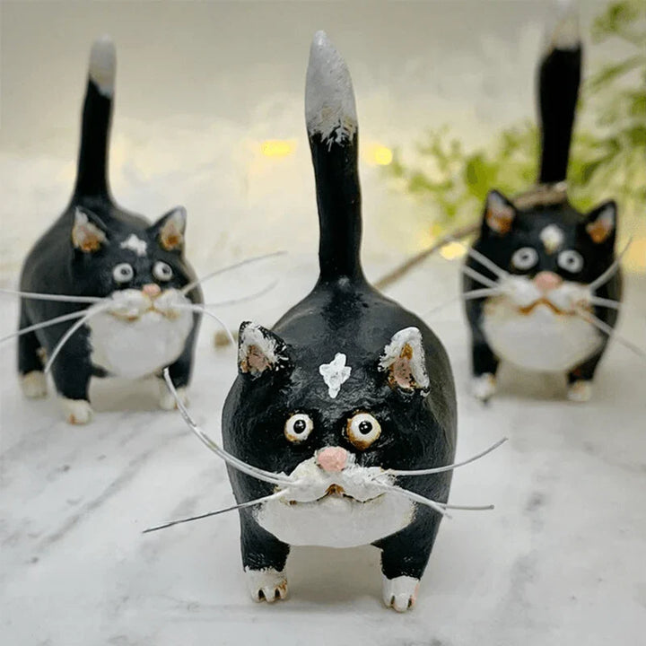 Whimsical handmade cat ornament, perfect for a festive Christmas tree. Pet-themed holiday decor.