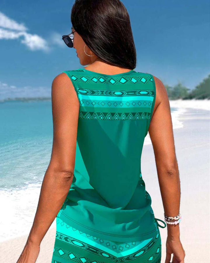 Vibrant printed two-piece tankini for women, featuring a trendy criss-cross swim top.