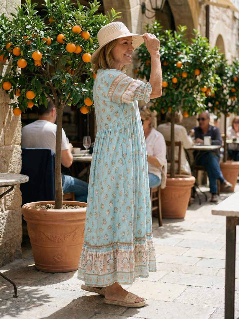 Everyday wear floral midi dress with a comfortable V-neck design. Chic and relaxed for women's spring fashion.