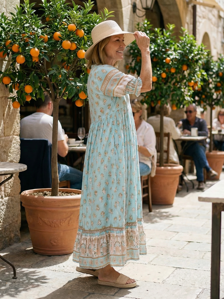 Everyday wear floral midi dress with a comfortable V-neck design. Chic and relaxed for women's spring fashion.