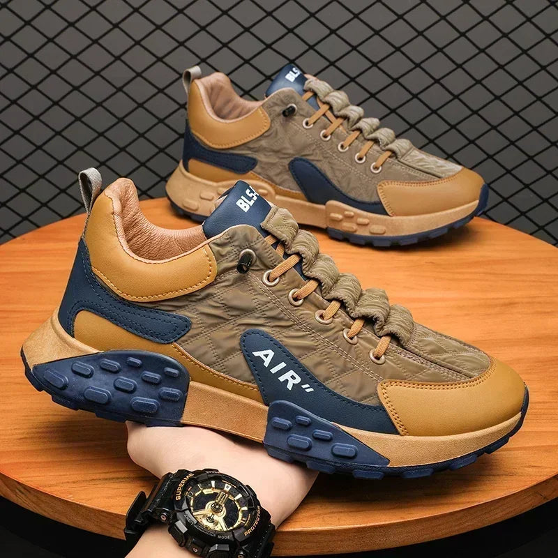 Modern men's athletic style trainers, black chunky platform design. Ideal urban footwear for a sleek casual look.