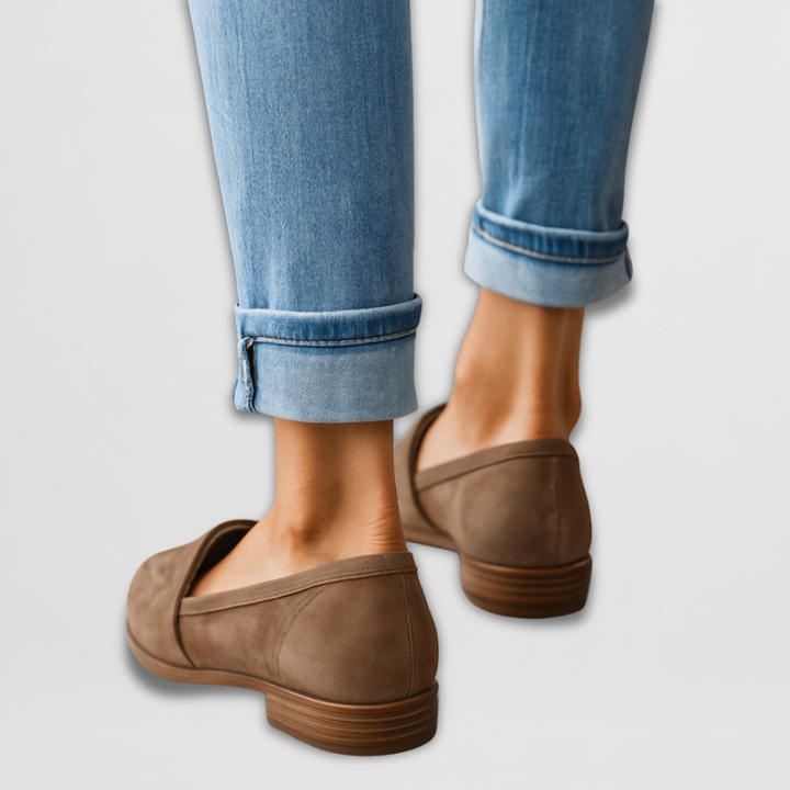 Women's pointed-toe comfort flats. Slip-on loafers offering elegant and versatile everyday style.