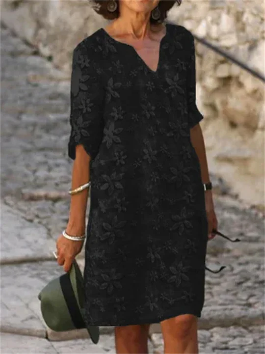 Trendy women's floral print summer dress with short sleeves. A chic, effortless fashion statement for summer.