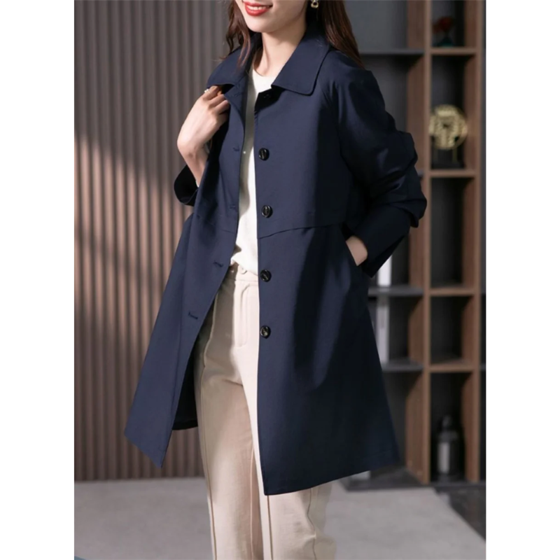 Elegant women's fall trench coat, a fashionable long jacket with a flattering tie-waist design.