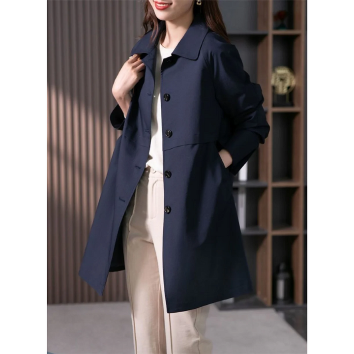 Elegant women's fall trench coat, a fashionable long jacket with a flattering tie-waist design.