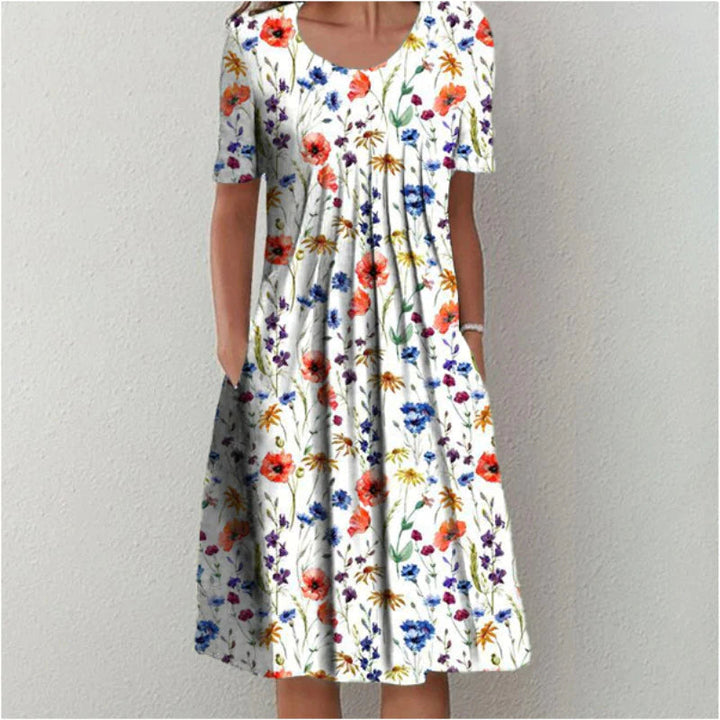 Elegant flowy summer dress for women, perfect for versatile casual and evening wear.