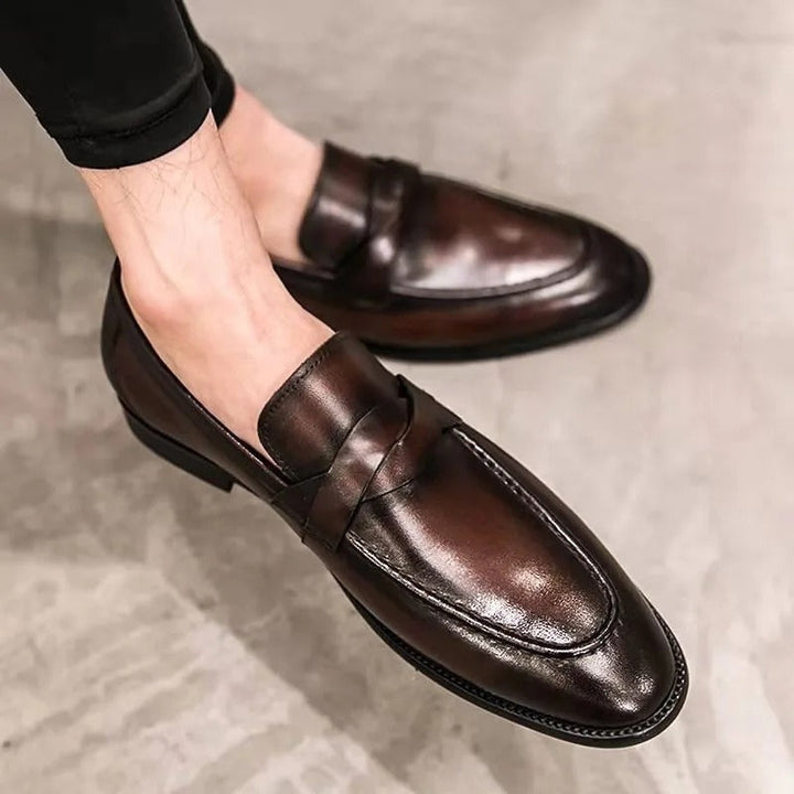 Elegant men's polished leather penny loafers with comfortable slip-on fit, ideal for effortless everyday style.