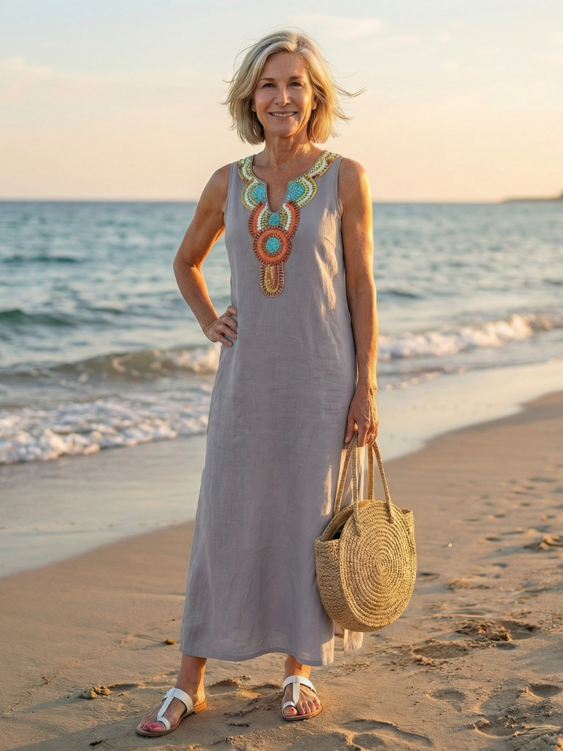 Casual sky blue flowy midi dress for women, sleeveless, embroidered, ideal for summer and beach travel.
