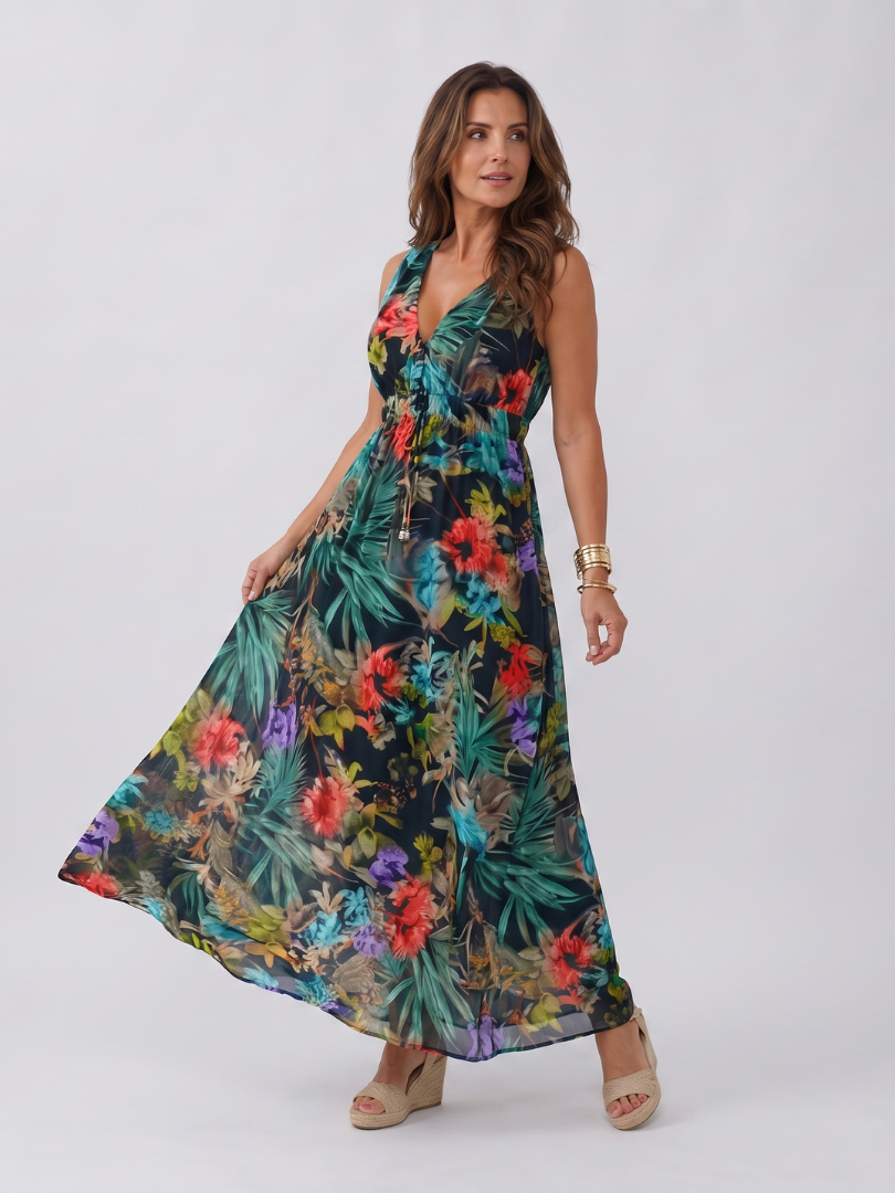 Women's flowy tropical print midi dress, sleeveless, empire waist, perfect for vacation or warm weather.