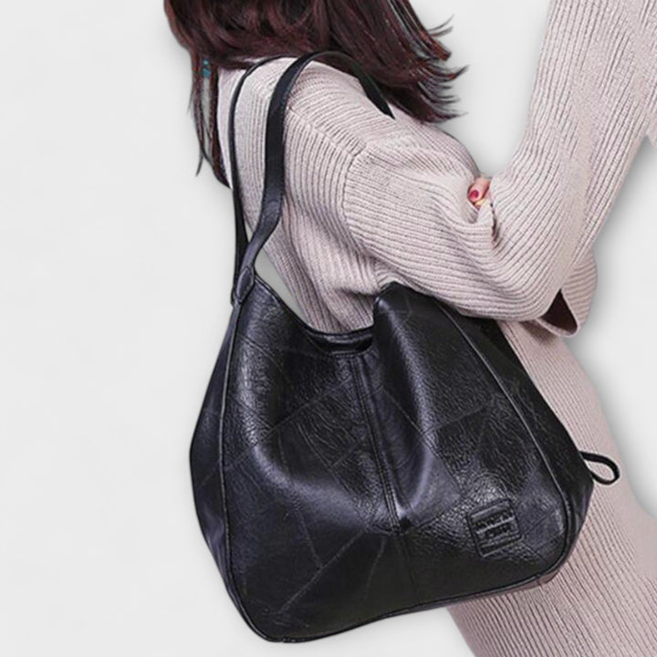 Versatile vintage leather shoulder bag, an elegant women's handbag for any occasion.