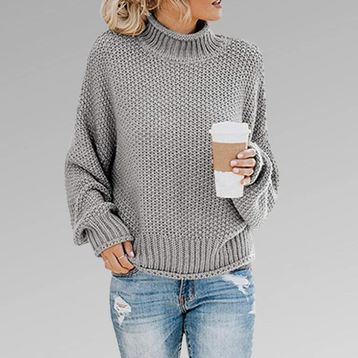 Women's long-sleeve knit sweater, elegant Scandinavian style for comfortable fall fashion.