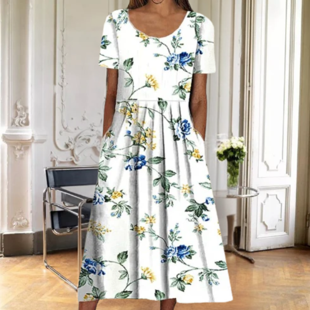 Chic women's floral midi dress for summer, featuring a comfortable short sleeve and classic round neck design.