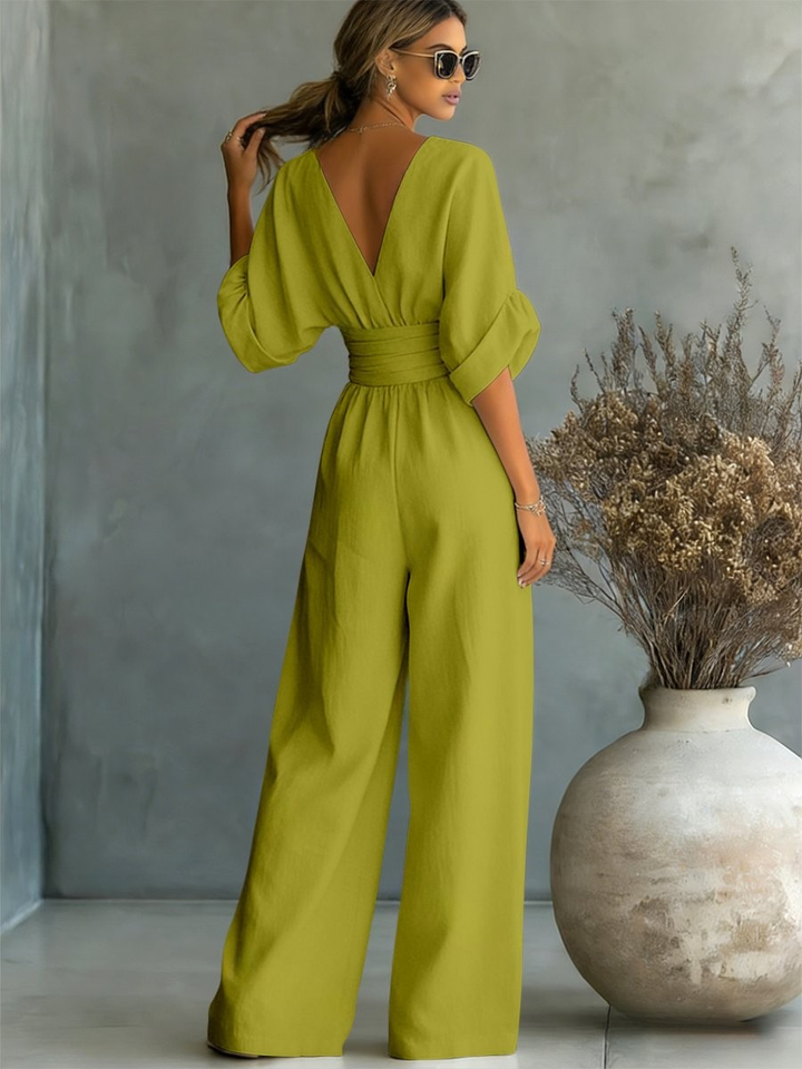 Day-to-night women's V-neck jumpsuit, offering effortless style for work or weekend wear.