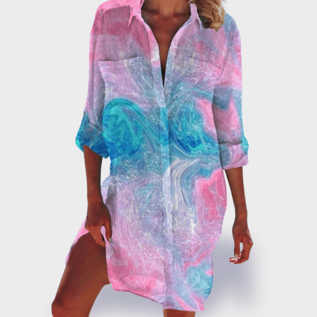 Flowy women's summer midi dress, lightweight and colorful, ideal for beach and casual wear.