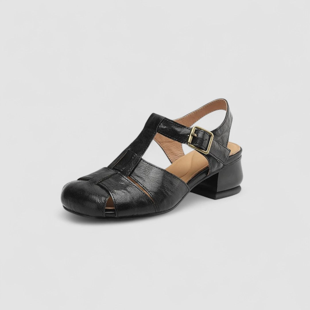 Orthopaedic black flat sandals for women, featuring a classic Mary Jane design and excellent arch support.