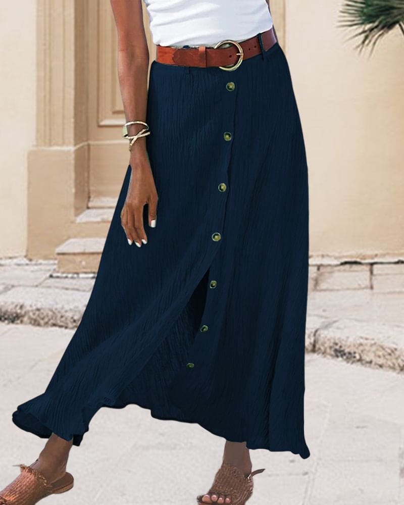 Elegant women's button-front maxi skirt in a flowing fabric, perfect for versatile all-season fashion.