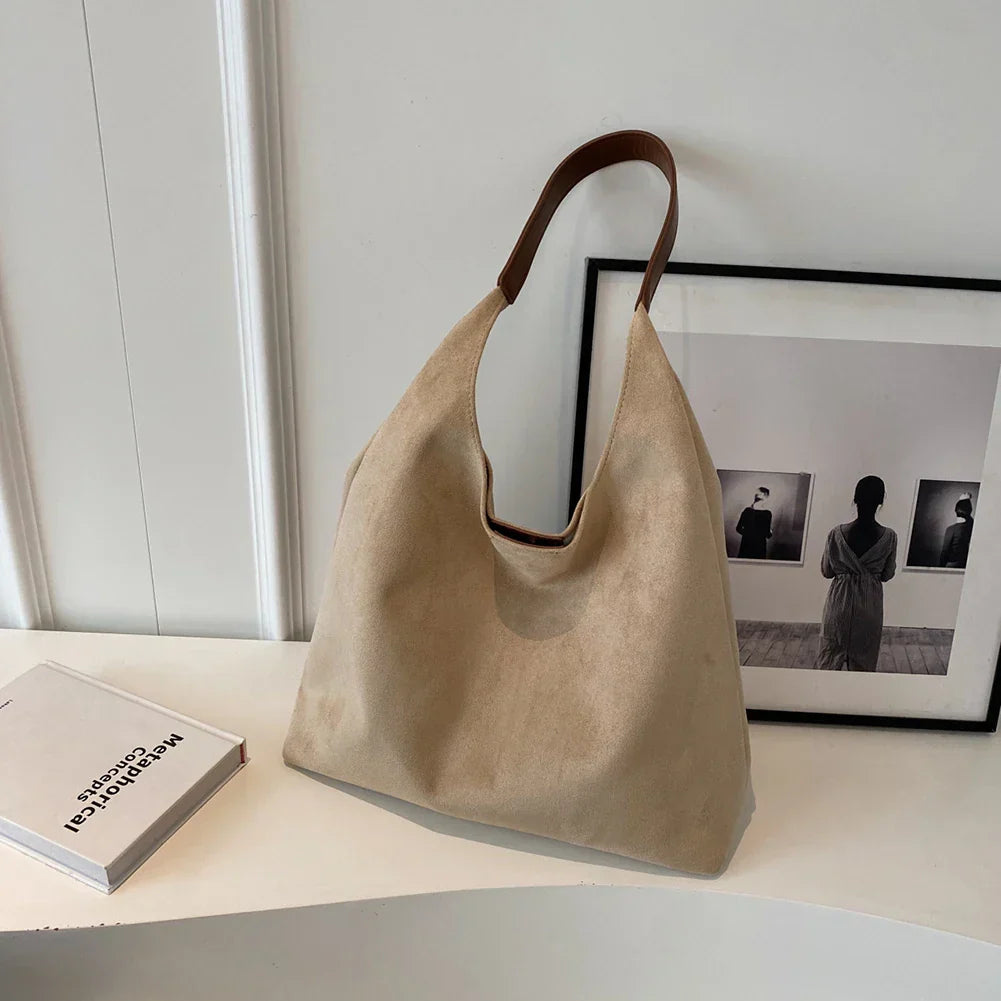 Luxurious coffee brown suede tote bag, a fashionable women's handbag & carryall.