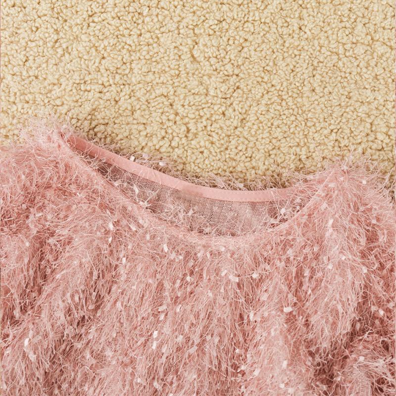 Warm women's solid color plush sweater with a classic round neck, ideal for chilly winter days.