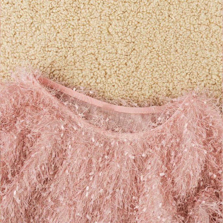 Warm women's solid color plush sweater with a classic round neck, ideal for chilly winter days.