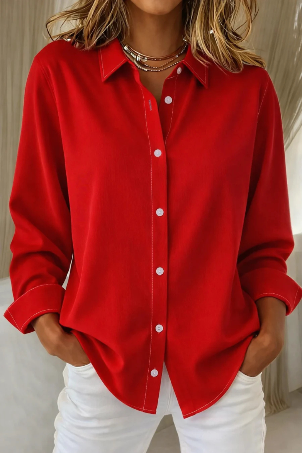 Stylish women's collared long sleeve shirt, relaxed fit, button down, a timeless piece for work or play.