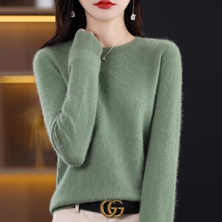 Soft knit women's sweater, a versatile round neck pullover perfect for chic winter styling.