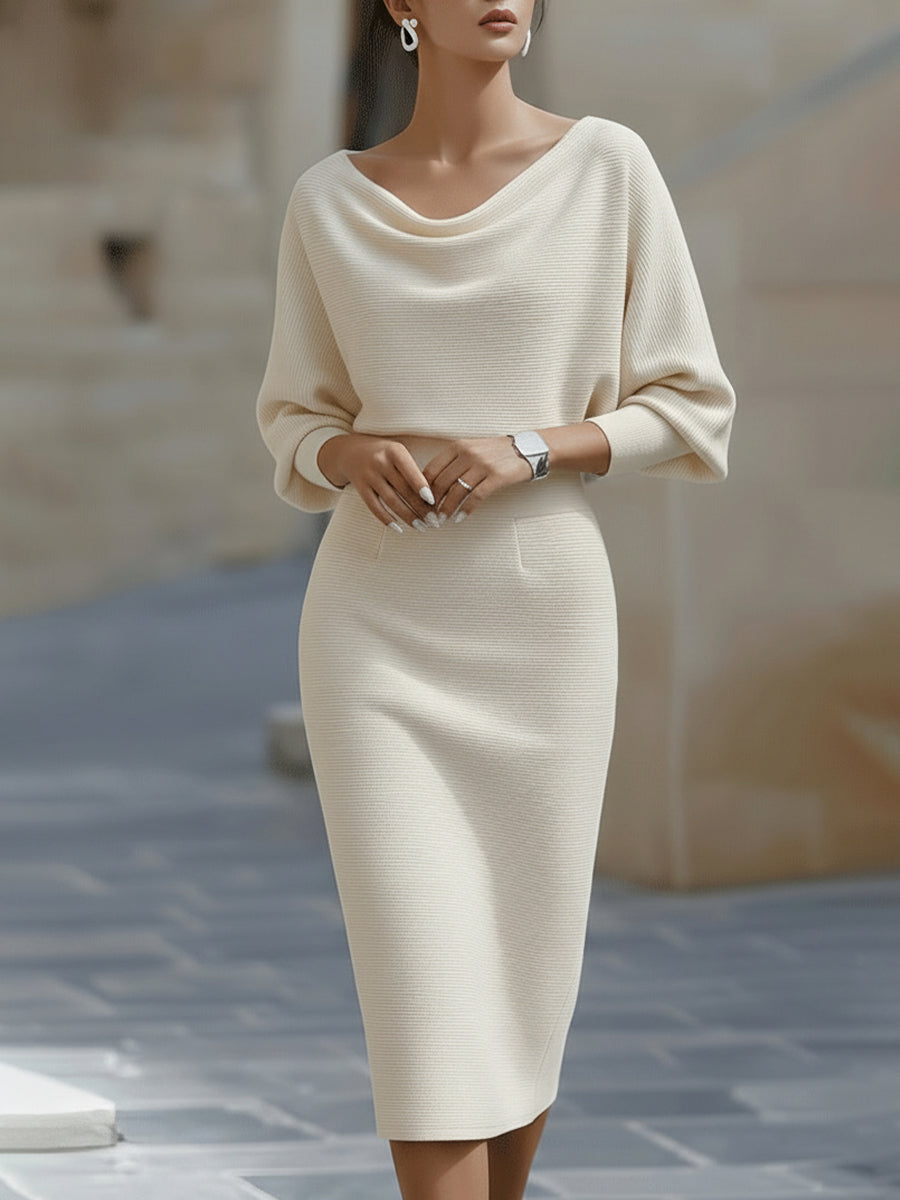Elegant women's occasion midi dress, round neck and batwing sleeves, versatile for day or evening.