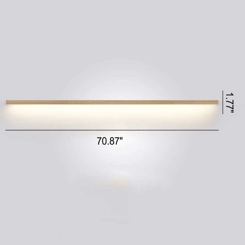 Elegant minimalist wooden wall lamp, casting a warm, atmospheric glow in any home setting.
