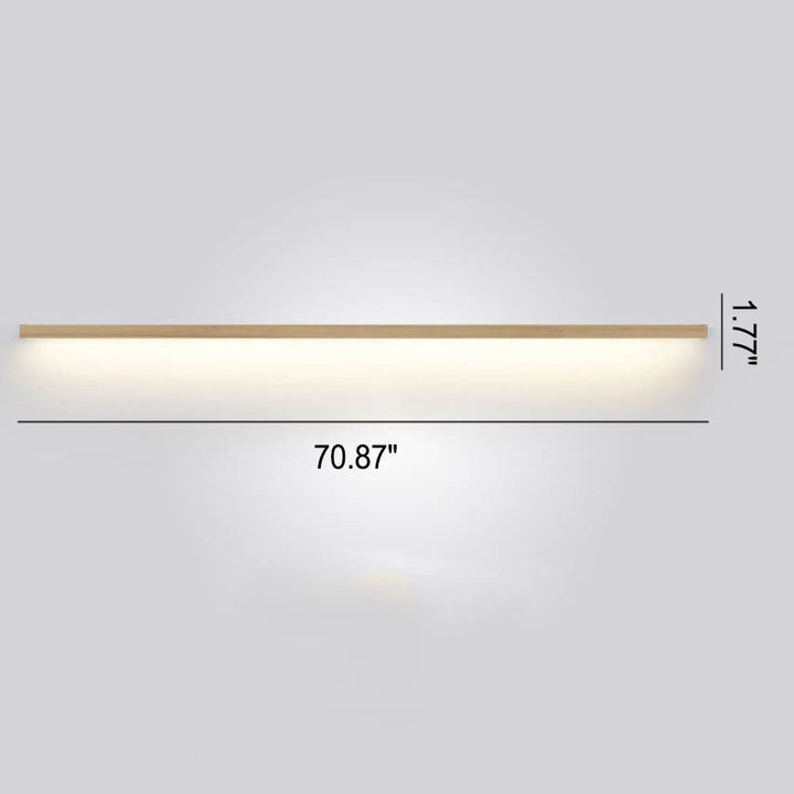 Elegant minimalist wooden wall lamp, casting a warm, atmospheric glow in any home setting.