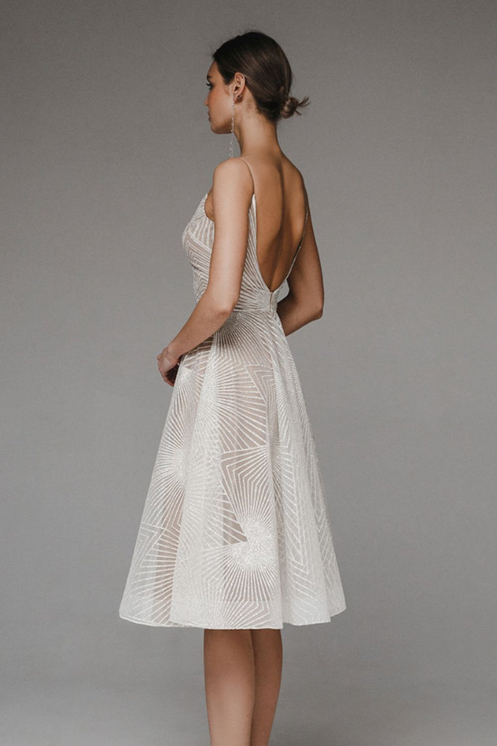 Shimmering women's elegant V-neck A-line dress with straps, a glamorous option for any special event.