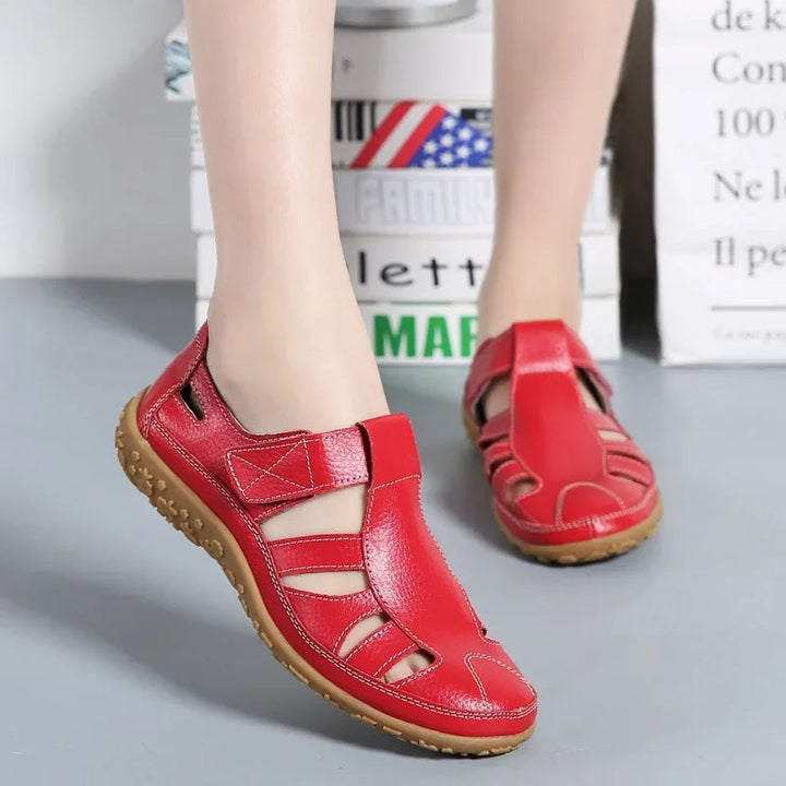 Top view: Women's casual brown leather open-toe sandals with easy-adjust velcro for summer comfort.