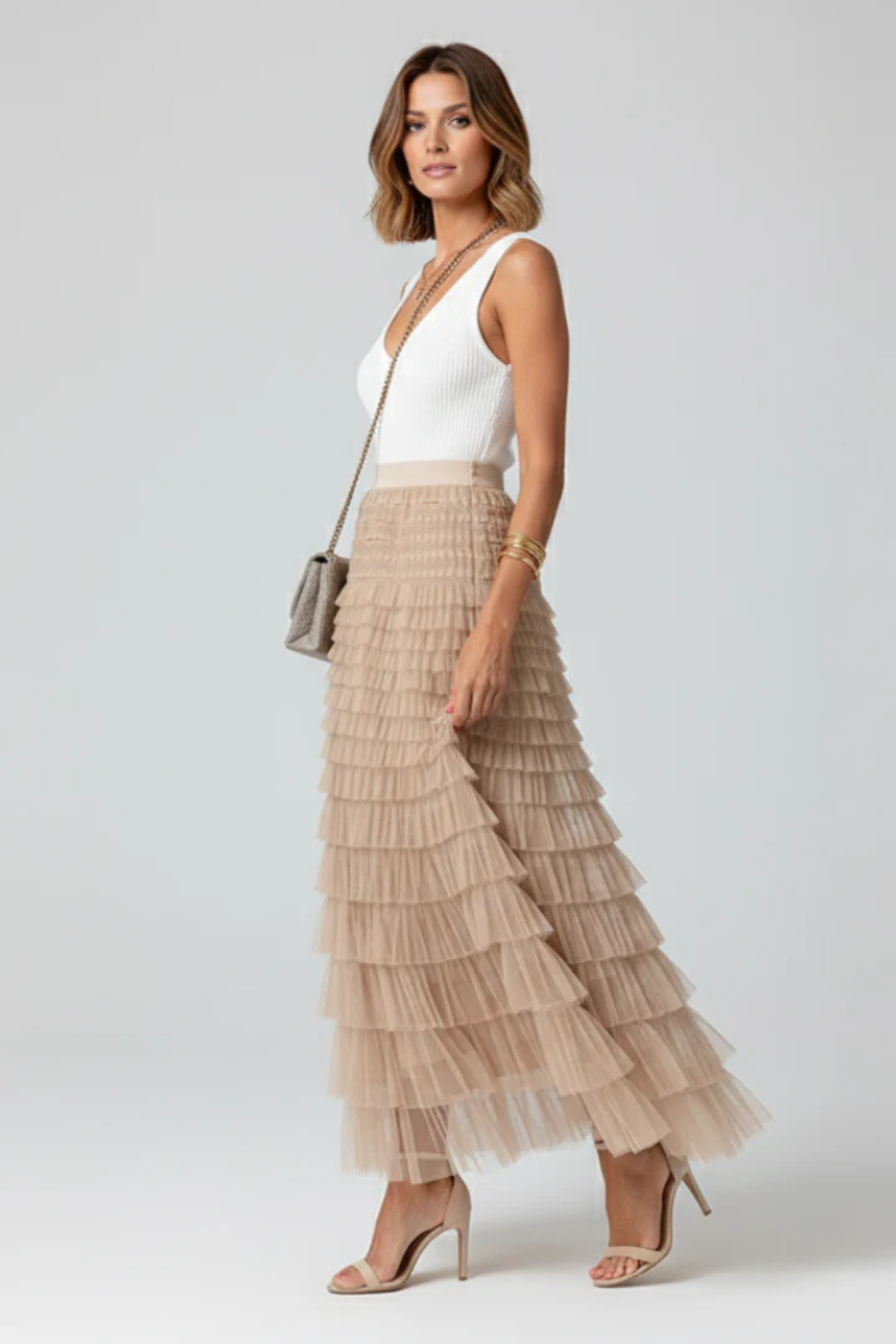 Flowy layered midi skirt for women, an elegant tiered design offering versatile style for any occasion.