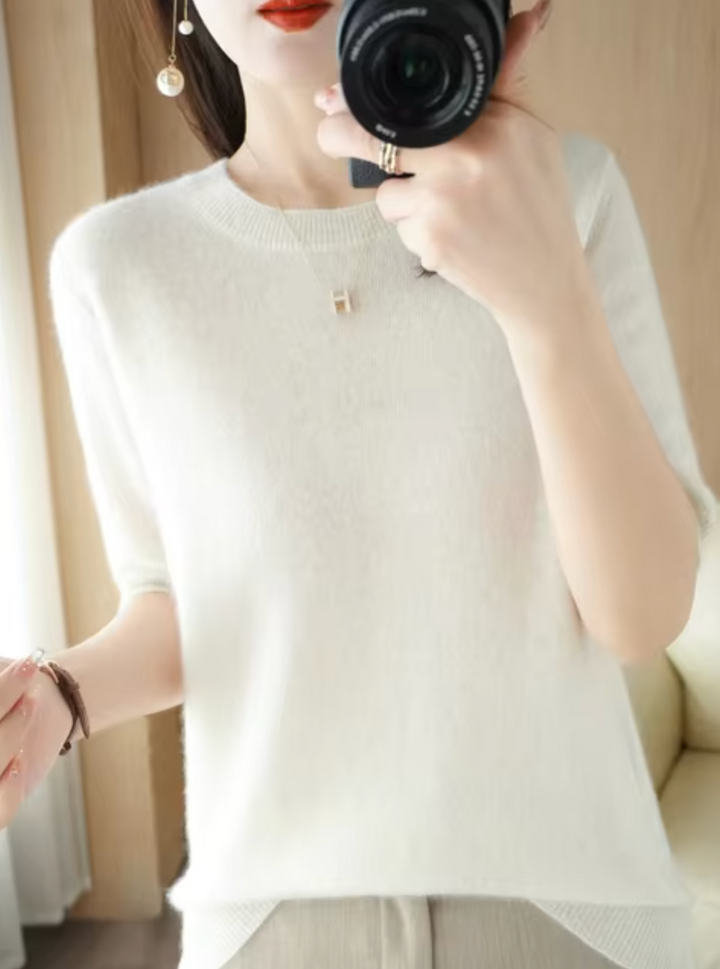Versatile women's short-sleeve knit sweater. Elegant, slim-fit everyday top, ideal for layering.