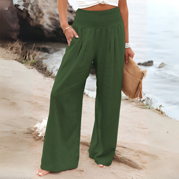 Fashionable high-waisted relaxed fit women's trousers, providing a comfortable and elegant look.