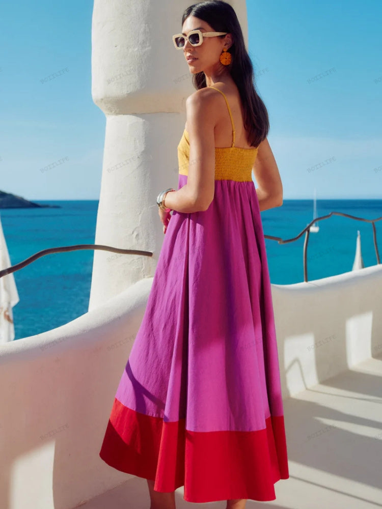 Stylish women's color block spaghetti strap midi dress, versatile for casual, vacation, or evening wear.