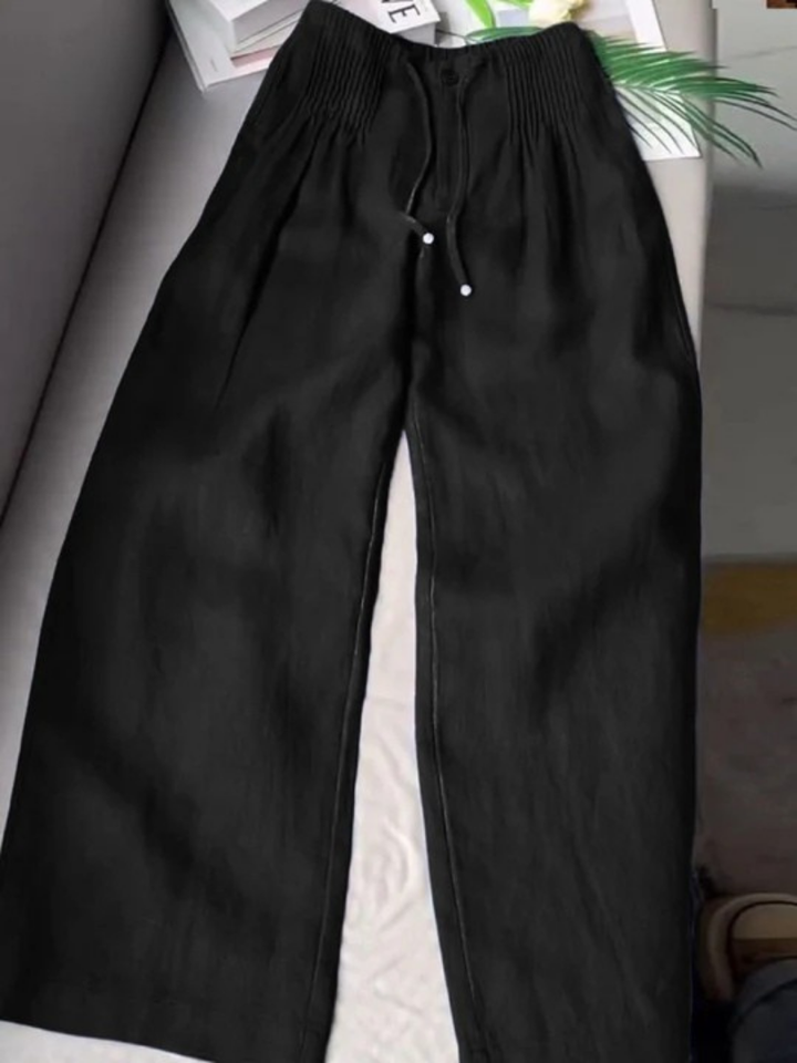 Women's comfortable wide-leg trousers, relaxed fit for elegant casual style.