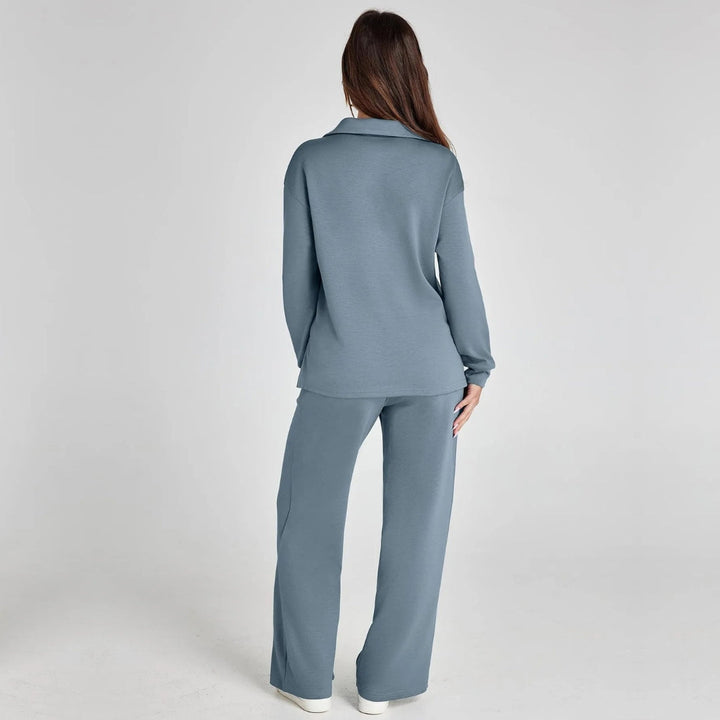 Relaxed fit women's V-neck top & wide leg trousers set. Ideal for casual comfort & stylish loungewear.